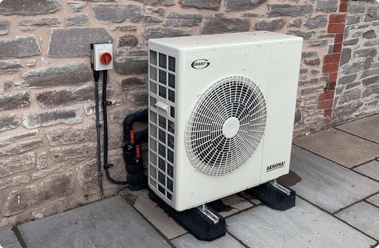 Heat pump outside the wall